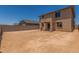 Large backyard featuring block fencing, with ample space ready for landscaping to create your dream outdoor space at 18351 W Patrick Ln, Surprise, AZ 85387