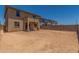 Vast backyard offers block fencing and endless possibilities for a personalized outdoor oasis and landscaping at 18351 W Patrick Ln, Surprise, AZ 85387