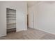 Bedroom with carpet, closet, and doorway at 18449 W Piedmont Rd, Goodyear, AZ 85338