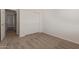 Bedroom with carpet, closet, and doorway at 18449 W Piedmont Rd, Goodyear, AZ 85338