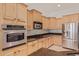 Beautiful kitchen with stainless steel appliances and granite countertops at 18449 W Piedmont Rd, Goodyear, AZ 85338