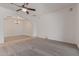Spacious living area leading into dining area at 18449 W Piedmont Rd, Goodyear, AZ 85338