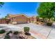 Charming single-story home with a well-manicured front yard and a two-car garage in a desirable location at 1865 E Locust Pl, Chandler, AZ 85286