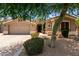 Charming home with a well-maintained front yard featuring desert landscaping and a welcoming entrance at 1865 E Locust Pl, Chandler, AZ 85286
