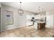 A kitchen with white cabinetry, stainless steel appliances, granite countertops, and a cozy breakfast nook at 1865 E Locust Pl, Chandler, AZ 85286