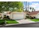 Charming single-story home with a two-car garage, well-maintained lawn, and attractive landscaping at 18780 N 94Th Ave, Peoria, AZ 85382