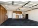 Spacious garage with ample storage cabinets, laundry area, and room for parking at 18780 N 94Th Ave, Peoria, AZ 85382