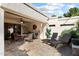 Inviting covered patio featuring outdoor seating, ideal for entertaining and enjoying the weather at 18780 N 94Th Ave, Peoria, AZ 85382