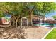 Backyard with storage shed, pergola, gravel and artificial turf at 20038 N 38Th Ln, Glendale, AZ 85308