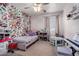 Charming bedroom with accent wall, plush carpet, and lots of natural light at 20038 N 38Th Ln, Glendale, AZ 85308