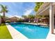 Resort-style pool area with ample space for outdoor entertaining at 20038 N 38Th Ln, Glendale, AZ 85308