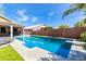 Backyard pool with diving board and deck, ideal for enjoying outdoor activities and relaxation at 20038 N 38Th Ln, Glendale, AZ 85308