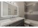 Cozy bathroom showcasing a marble countertop vanity, bathtub, and shower at 20452 E Appaloosa Dr, Queen Creek, AZ 85142