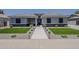 Beautiful single Gathering home with drought resistant landscaping, walkway, and neutral color scheme at 20452 E Appaloosa Dr, Queen Creek, AZ 85142