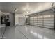 Spacious three car garage with epoxy flooring and ample lighting at 20452 E Appaloosa Dr, Queen Creek, AZ 85142
