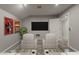 Cozy home theater setup with comfortable seating and a large screen for entertainment at 20452 E Appaloosa Dr, Queen Creek, AZ 85142