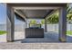 Hot tub nestled in a covered area, offering privacy and relaxation in the backyard at 20452 E Appaloosa Dr, Queen Creek, AZ 85142