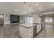Open concept kitchen with large island, stainless steel appliances, and recessed lighting at 20452 E Appaloosa Dr, Queen Creek, AZ 85142