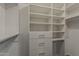 Organized walk-in closet with ample shelving and drawers for optimal storage at 20452 E Appaloosa Dr, Queen Creek, AZ 85142