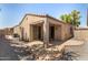 Backyard featuring a covered patio, privacy wall and low maintenance gravel landscaping at 2063 S Edgewater --, Mesa, AZ 85209
