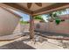 Covered patio offers shade in the landscaped backyard with a ceiling fan for added comfort at 2063 S Edgewater --, Mesa, AZ 85209