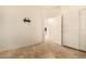 Bright and airy bedroom with neutral paint, tile flooring, and closet for storage at 2063 S Edgewater --, Mesa, AZ 85209