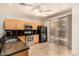Functional kitchen with stainless steel appliances, granite countertops and backyard access at 2063 S Edgewater --, Mesa, AZ 85209