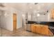 Efficient kitchen featuring tile floors, light wood cabinetry, stainless steel appliances and granite counters at 2063 S Edgewater --, Mesa, AZ 85209