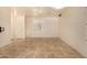 Open concept living room with tile flooring, ceiling fans, and open access to another room at 2063 S Edgewater --, Mesa, AZ 85209