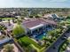 Aerial view featuring the backyard oasis with pool, spa, putting green, and lush landscaping at 24695 S 195Th Way, Queen Creek, AZ 85142