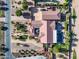 Stunning aerial view of the property with pool, putting green, lush landscaping, and circular driveway at 24695 S 195Th Way, Queen Creek, AZ 85142