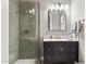 Modern bathroom featuring a tiled shower and dark vanity at 24695 S 195Th Way, Queen Creek, AZ 85142