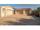Three-car garage with spacious driveway, providing ample parking and storage at 24695 S 195Th Way, Queen Creek, AZ 85142
