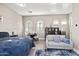 Cozy suite with a seating area, small table, and modern mini-fridge at 24695 S 195Th Way, Queen Creek, AZ 85142