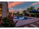 Inviting backyard with a pool, lounge chairs, and landscaped greenery at 24695 S 195Th Way, Queen Creek, AZ 85142
