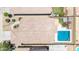 Aerial shot showcasing the property's layout with pool, patio, and landscaping at 25840 W Whyman St, Buckeye, AZ 85326