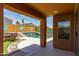 Inviting backyard patio area with a pool and ample space for outdoor relaxation and entertaining at 25840 W Whyman St, Buckeye, AZ 85326