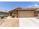 Charming single Gathering home with a 2-car garage, desert landscaping, and well-maintained front yard at 25840 W Whyman St, Buckeye, AZ 85326