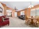 Bright open-concept living area with modern furnishings and plenty of room for entertaining and relaxation at 25840 W Whyman St, Buckeye, AZ 85326