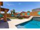 Enjoyable backyard featuring a pool with steps and a hot tub at 25840 W Whyman St, Buckeye, AZ 85326
