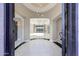 Grand foyer showcasing high ceilings, elegant lighting, and an open view to the living area at 26204 S Washington St, Chandler, AZ 85249
