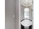 Elegant foyer with black and white marble flooring and arched entryway into a bright living space at 26204 S Washington St, Chandler, AZ 85249