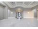 Grand foyer featuring tile flooring, arched entryway, and decorative front door at 26204 S Washington St, Chandler, AZ 85249