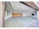 Large three-car garage with epoxy floors, built-in storage, windows and multiple lighting fixtures at 26204 S Washington St, Chandler, AZ 85249