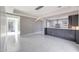 Open concept kitchen and dining area with modern lighting and sleek countertops at 26204 S Washington St, Chandler, AZ 85249