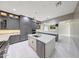 Kitchen features a central island with stainless steel appliances and a view to the dining area at 26204 S Washington St, Chandler, AZ 85249