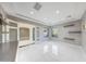 Open office space with a built-in desk and view into the foyer at 26204 S Washington St, Chandler, AZ 85249