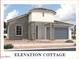 Charming cottage-style home featuring stone accents, a covered entry, and a two-car garage at 36907 W Santa Maria St, Maricopa, AZ 85138