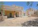 Spacious backyard featuring covered patio and desert landscaping at 38065 N Cave Creek Rd # 2, Cave Creek, AZ 85331