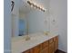 Bathroom vanity area with dual sinks and large mirror at 38065 N Cave Creek Rd # 2, Cave Creek, AZ 85331